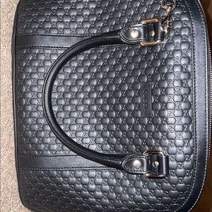 Medium Black Gucci Bag.